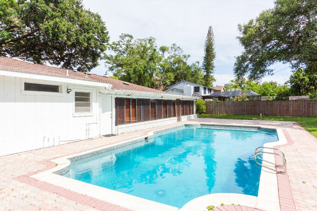 Coming soon for sale single family 4 bedroom 3.5 bath pool home with in-law suite in Temple Terrace FL 33617